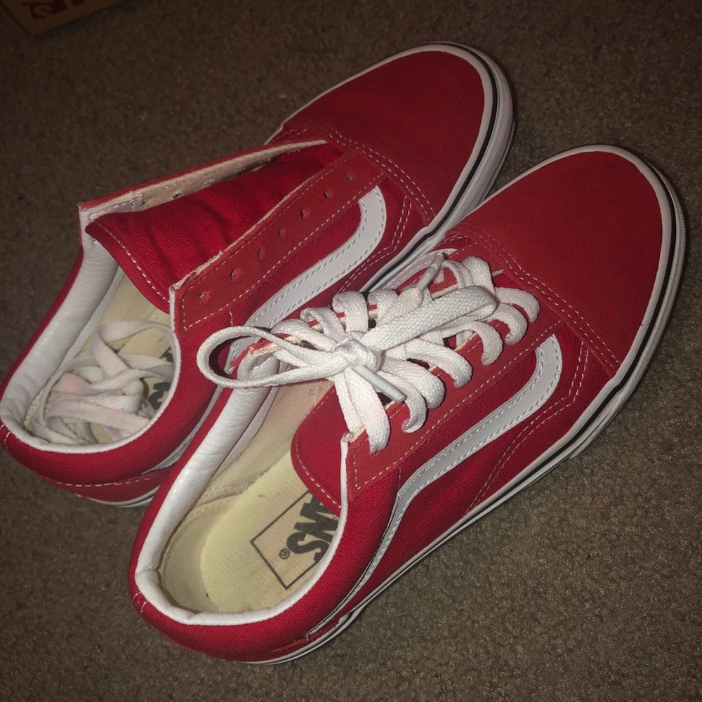 Red low top vans.